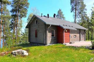 Курортные отели Rauhalahti Holiday Homes Куопио Вилла с двумя спальнями и сауной.-9